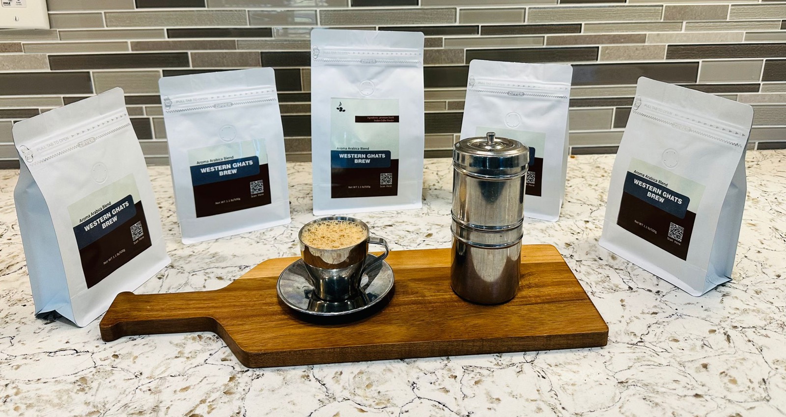 Western Ghats Brew coffee pouches with a traditional South Indian filter coffee